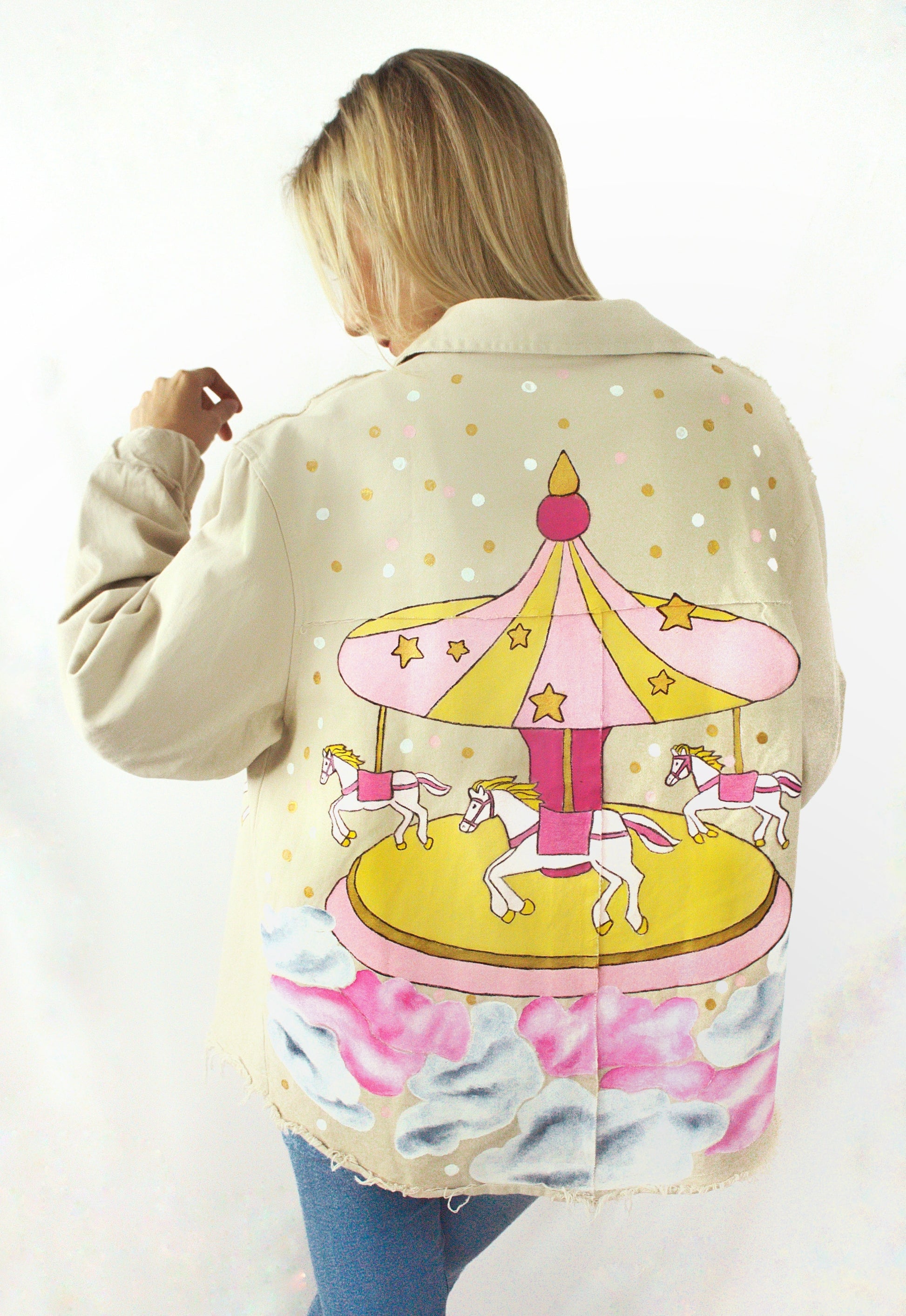 Hand-painted oversized gabardine jacket with carousel horse design in pink, gold, and white for women